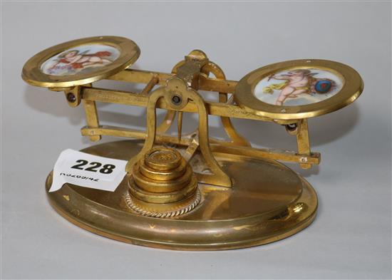 A set of Edwardian ormolu and porcelain letter scales, signed Phillipson & Golder, Chester